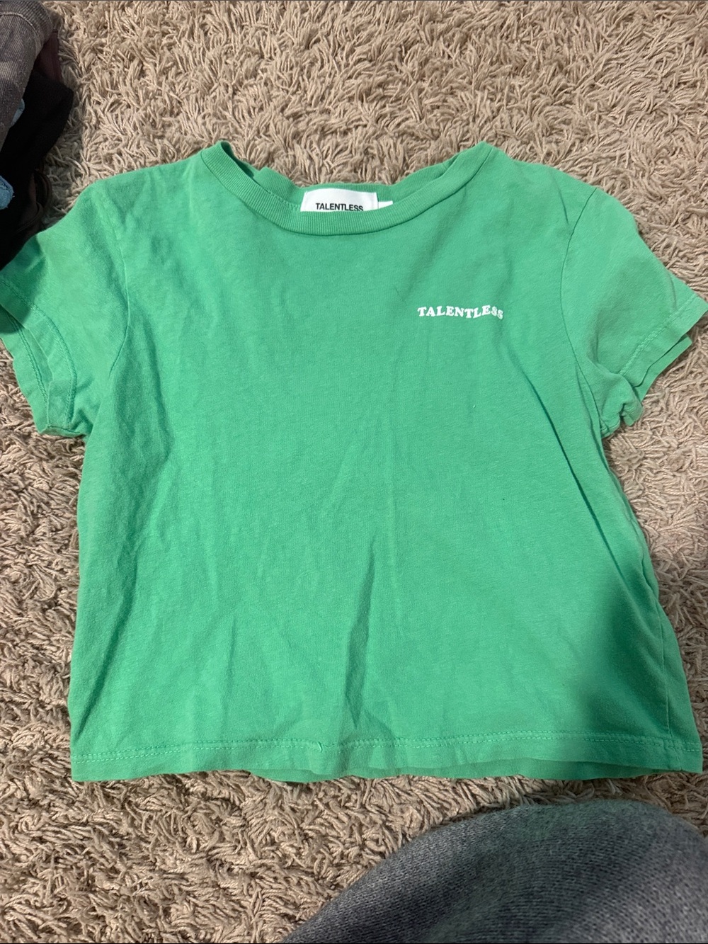 Talentless women’s green baby tee